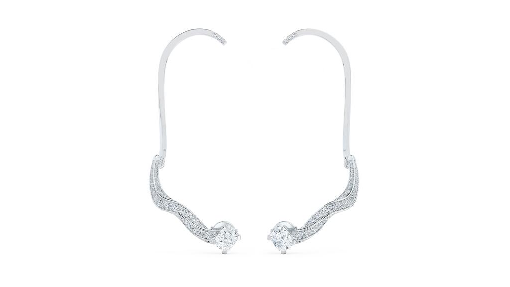 Ear cuffs featuring a cushion-cut diamond and twisting diamond-set white gold De Beers high jewelry Spirituality Ear Cuffs